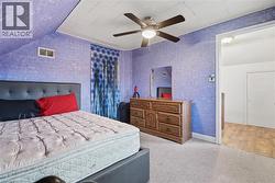 Bedroom featuring carpet flooring and ceiling fan -