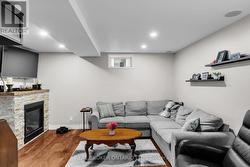 Lower Level Living room With Fireplace -