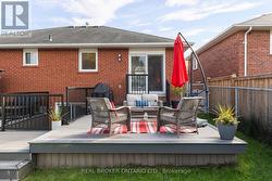 Back yard with walkout and composite deck -