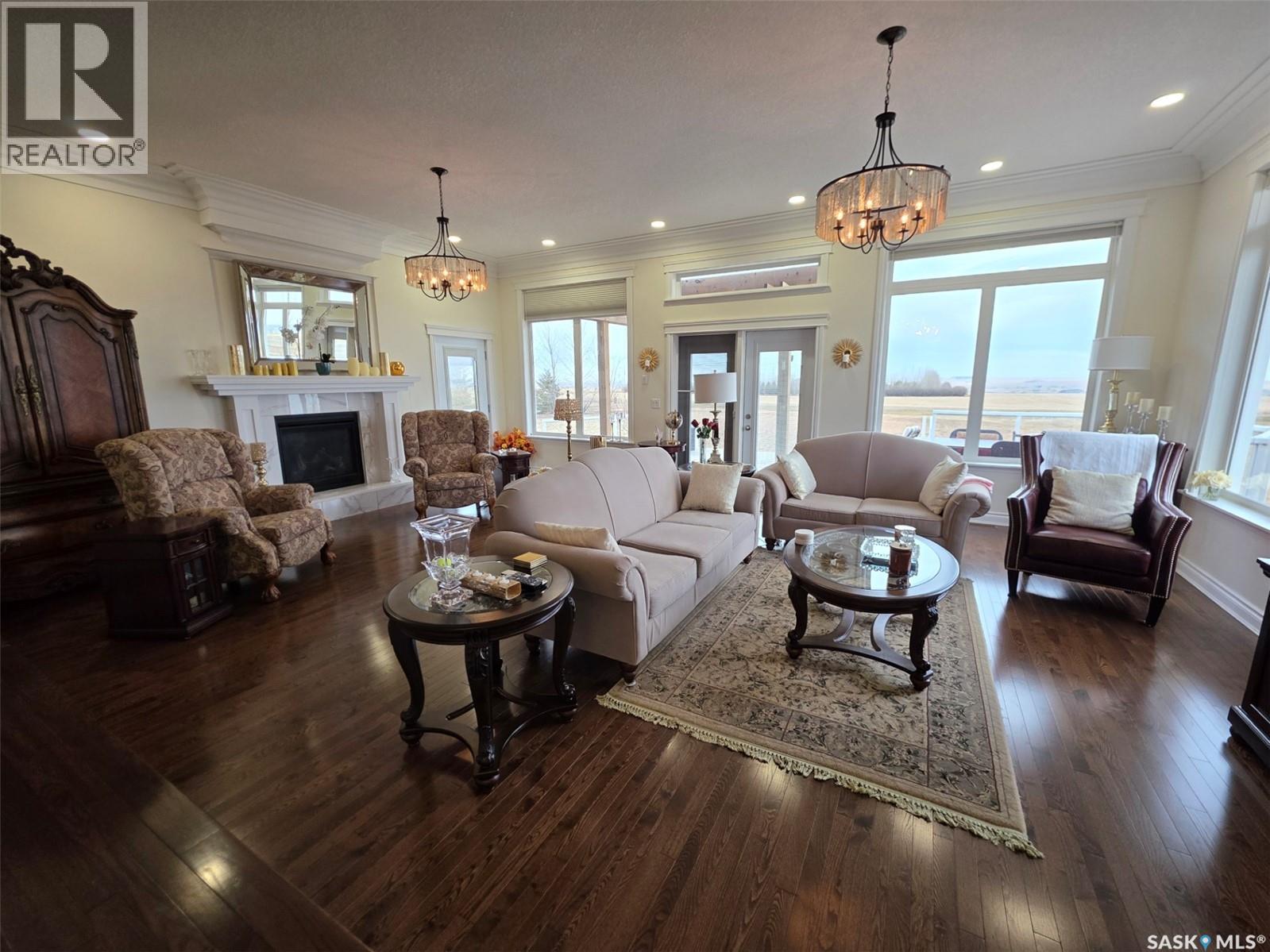 Banman Acreage, Swift Current Rm No. 137, SK - Indoor Photo Showing Living Room With Fireplace