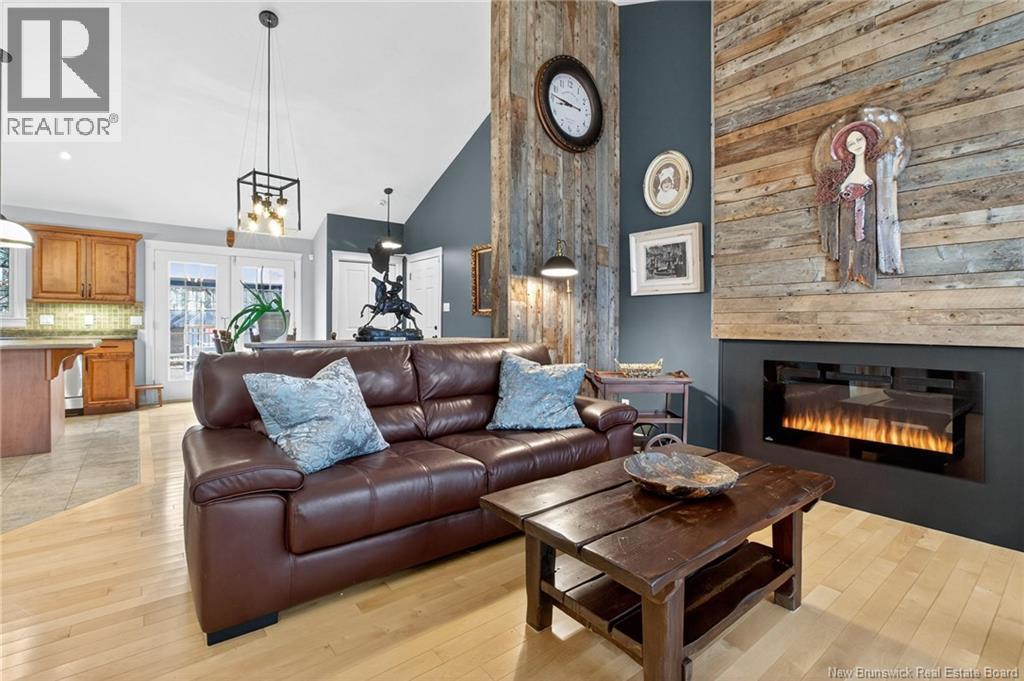 living room - 388 Grande-Vallee Street, Dieppe, NB - Indoor Photo Showing Living Room With Fireplace