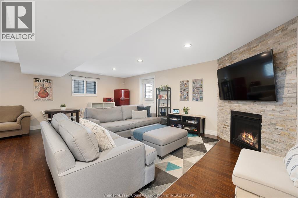 1345 Deer Run Trail, Lakeshore, ON - Indoor Photo Showing Living Room With Fireplace