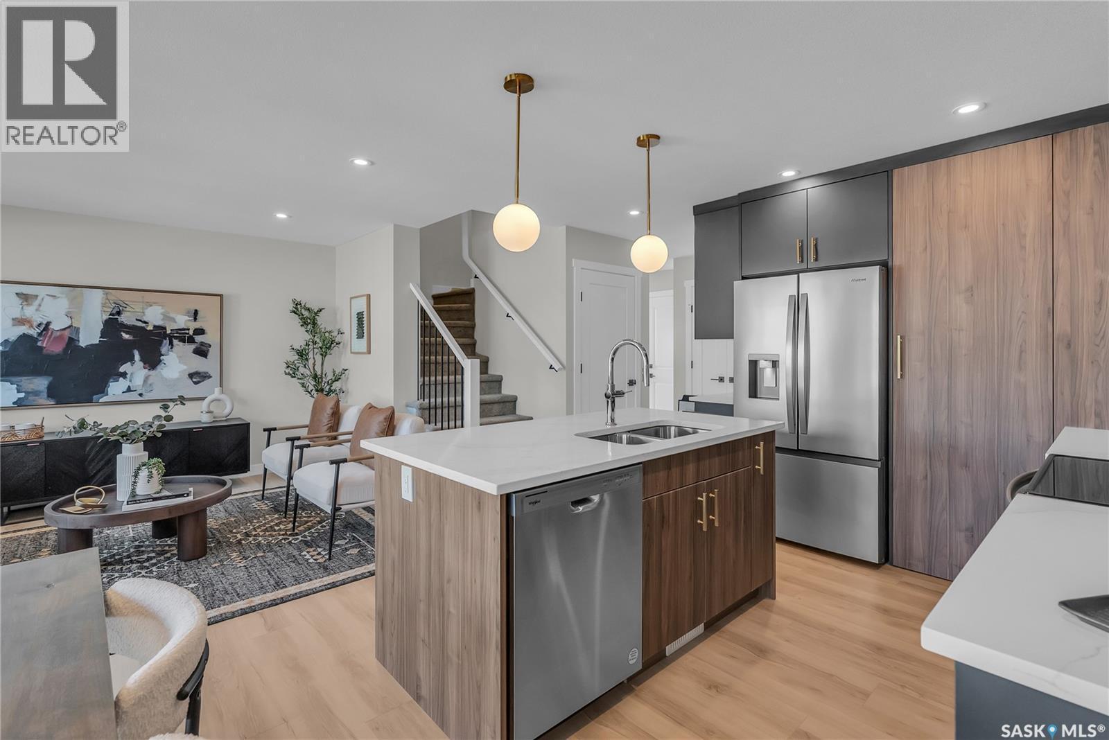 404 155 Mcfaull Way, Saskatoon, SK - Indoor Photo Showing Kitchen With Double Sink With Upgraded Kitchen