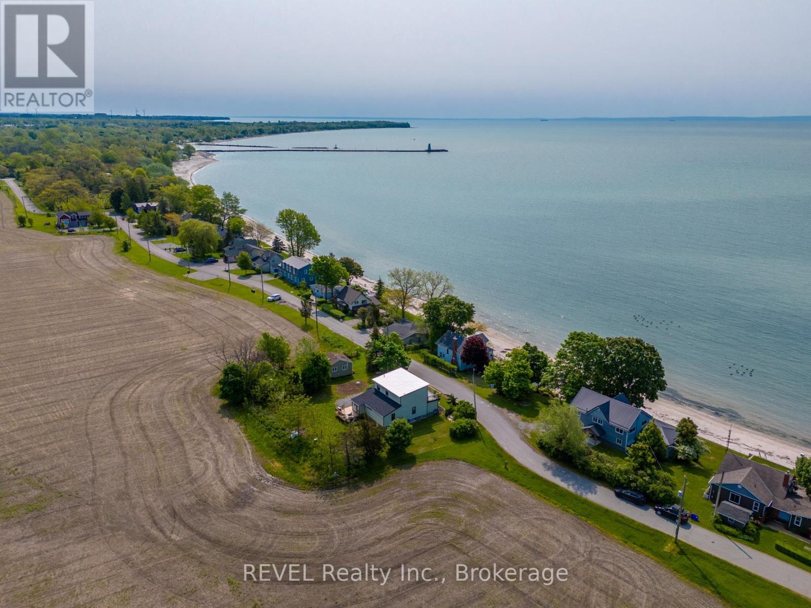 Ariel view and the lighthouse! - 80 Lighthouse Drive, Haldimand (Dunnville), ON - Outdoor With Body Of Water With View