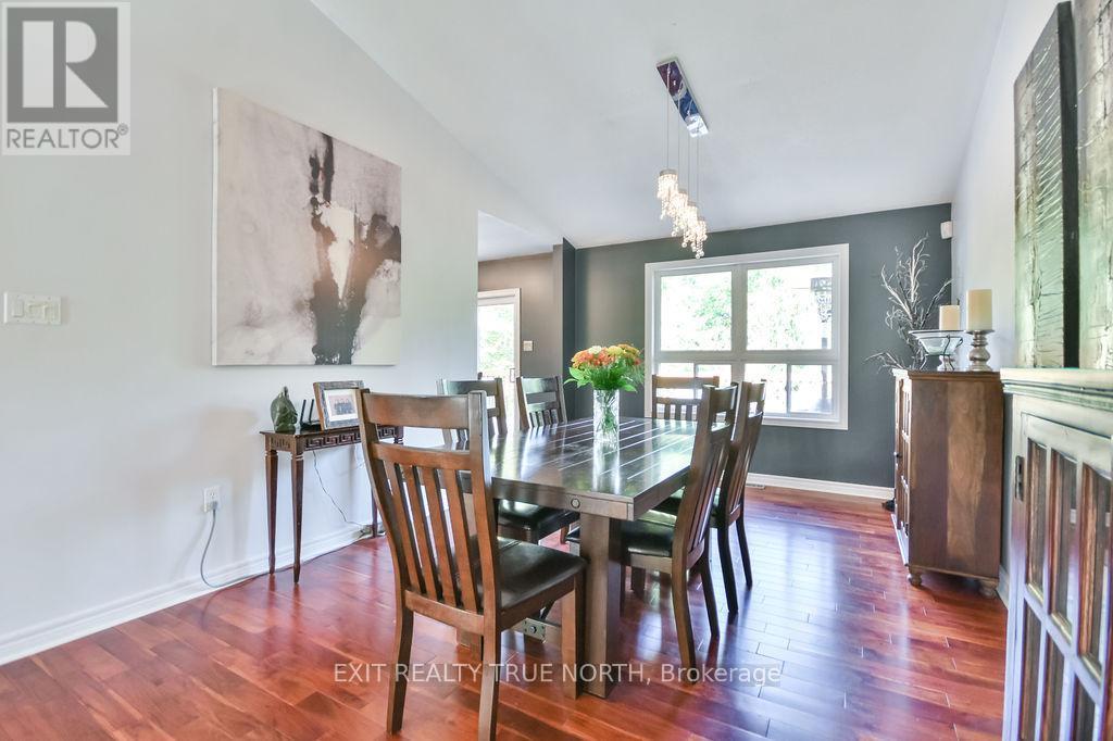 Soaring cathedral ceilings - 28 Nicholson Crescent, Springwater, ON - Indoor Photo Showing Dining Room