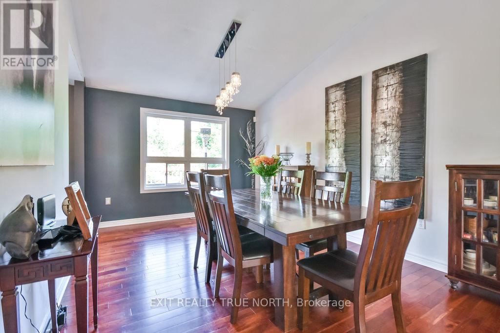 Brazilian Cherry hardwood floors - 28 Nicholson Crescent, Springwater, ON - Indoor Photo Showing Dining Room