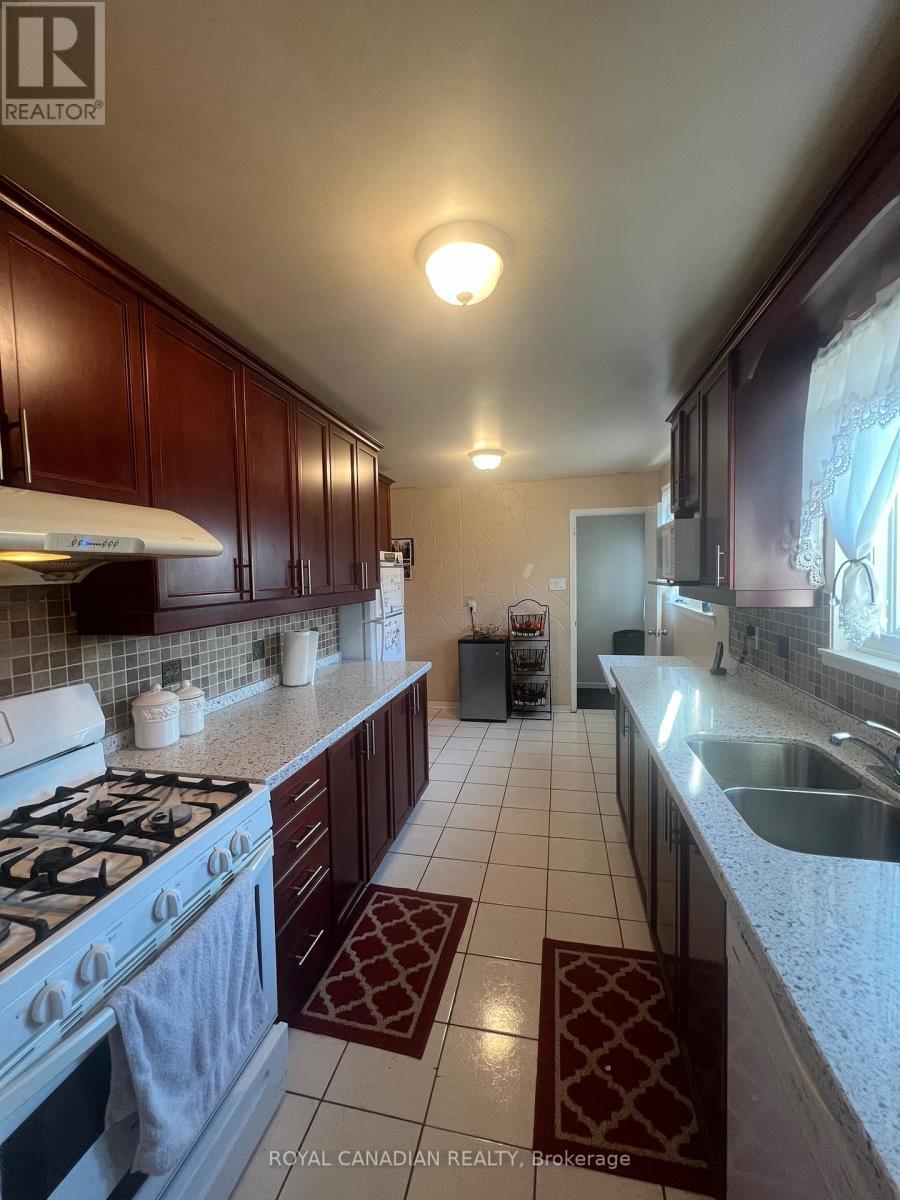 Upper - 6 O'Henry Grove, Toronto, ON - Indoor Photo Showing Kitchen With Double Sink