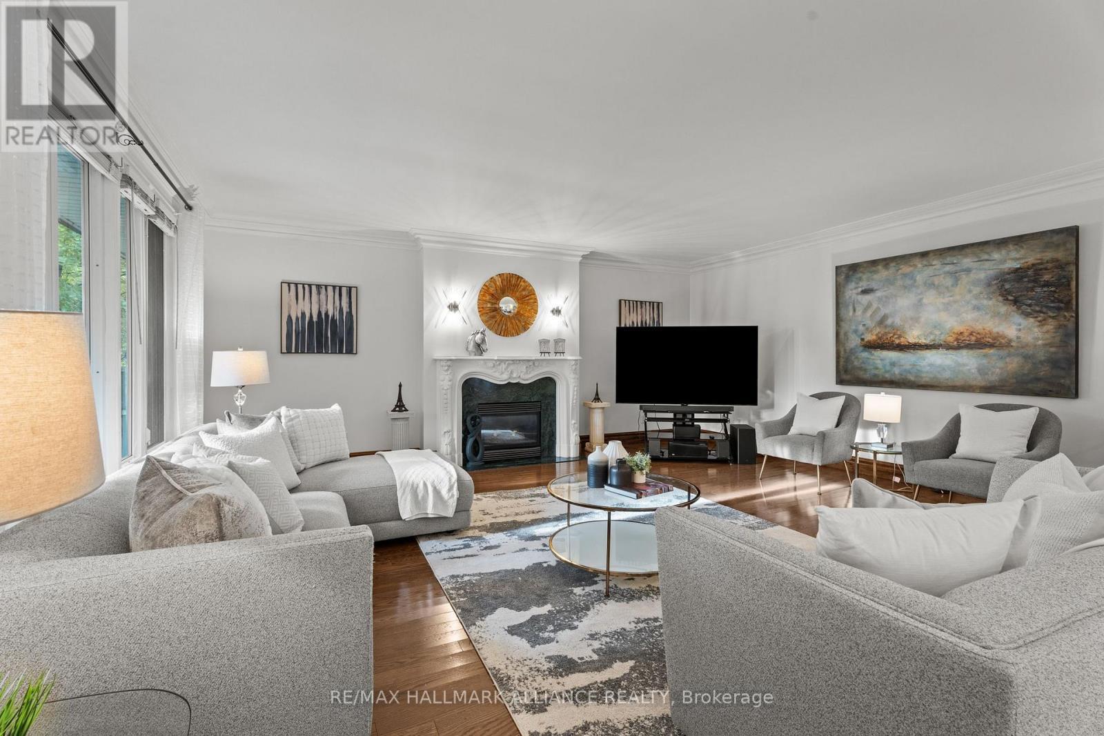 130 Tavistock Square, Oakville, ON - Indoor Photo Showing Living Room With Fireplace