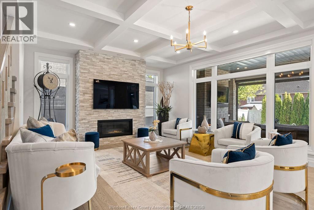258 Xavier Circle, Lakeshore, ON - Indoor Photo Showing Living Room With Fireplace