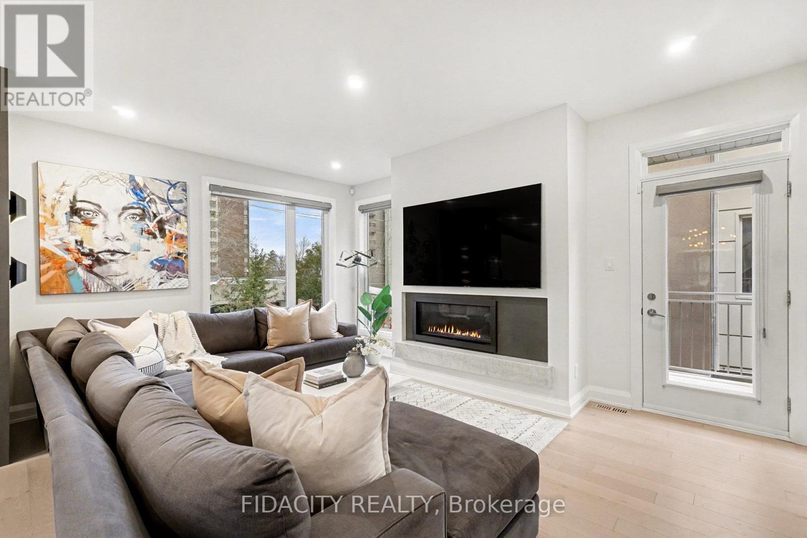 103 Tay Street, Ottawa, ON - Indoor Photo Showing Living Room With Fireplace