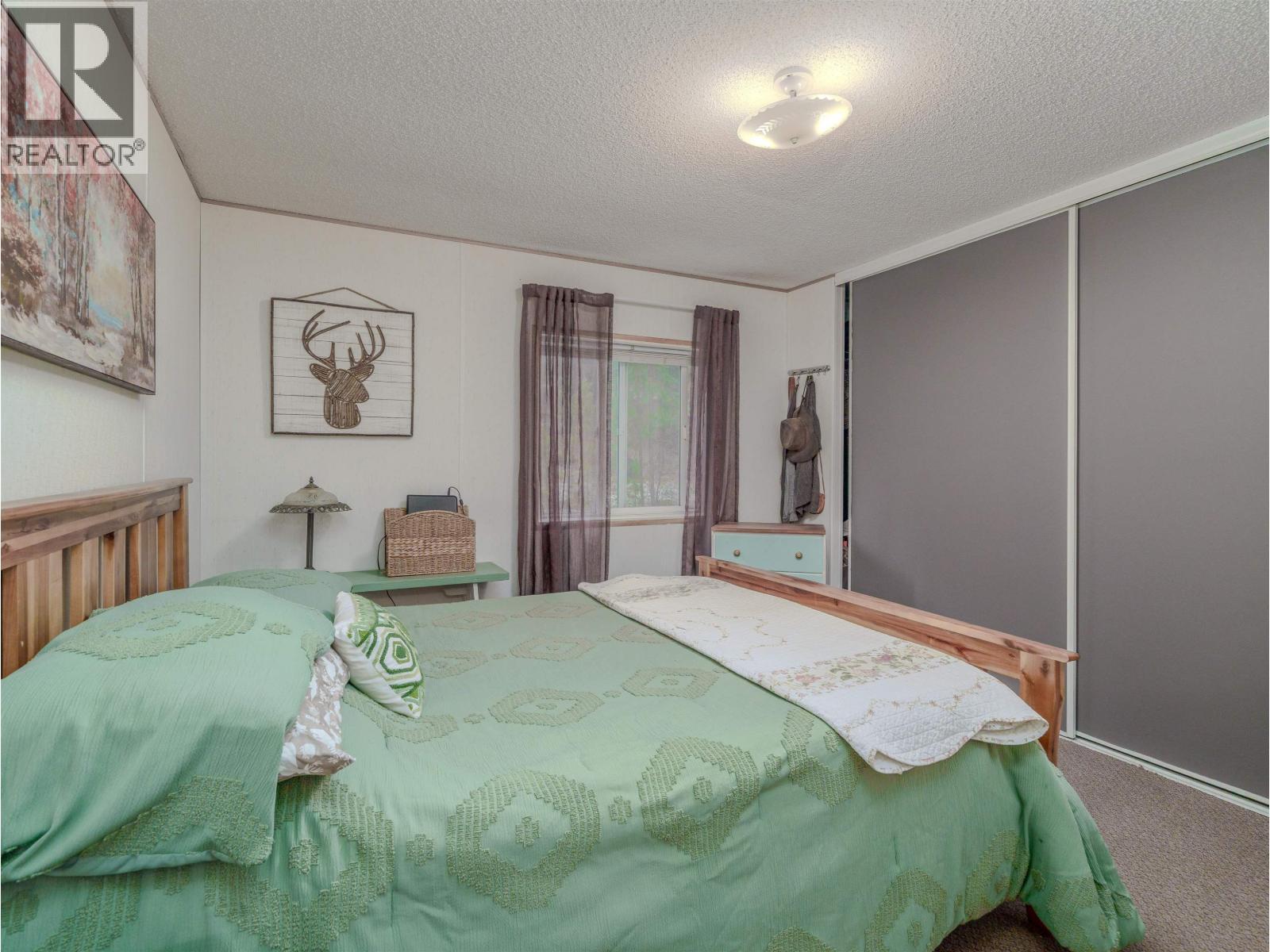 6324 Wolfe Road, 100 Mile House, BC - Indoor Photo Showing Bedroom