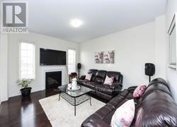 10 O'Connor Crescent, Brampton, ON - Indoor Photo Showing Living Room With Fireplace