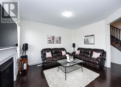 10 O'Connor Crescent, Brampton, ON - Indoor Photo Showing Living Room With Fireplace