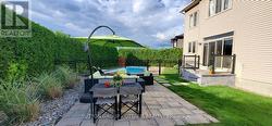 Fully landscaped yard with in-ground pool -