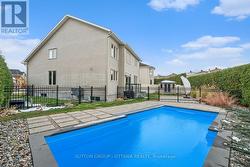 Fully landscaped yard with in-ground pool -