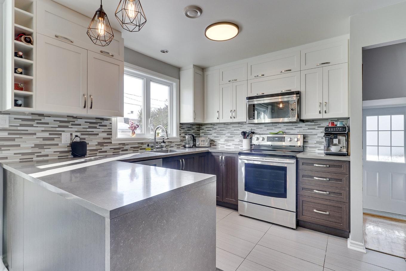 Cuisine - 660 Rue De Livaudière, Terrebonne (Terrebonne), QC - Indoor Photo Showing Kitchen With Upgraded Kitchen