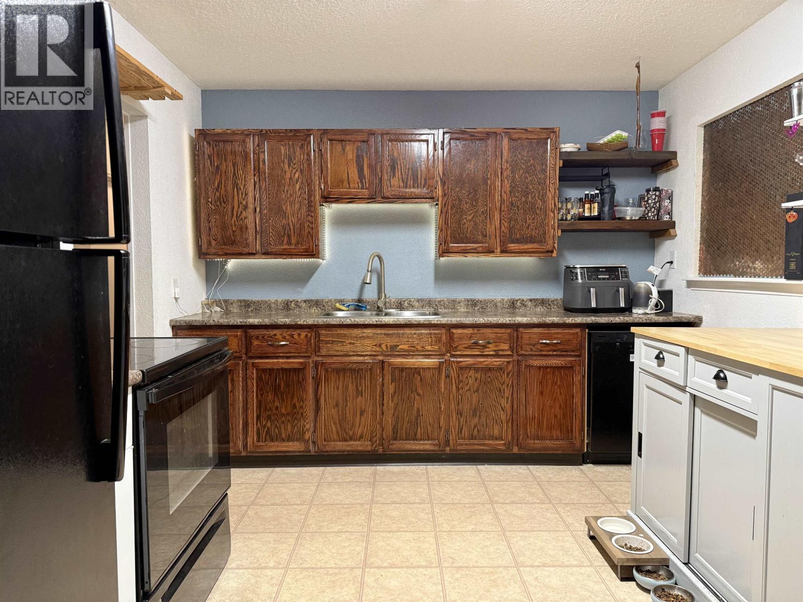 15 Omenica Street, Kitimat, BC - Indoor Photo Showing Kitchen With Double Sink