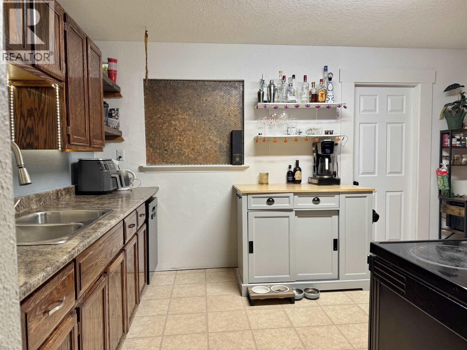 15 Omenica Street, Kitimat, BC - Indoor Photo Showing Kitchen With Double Sink
