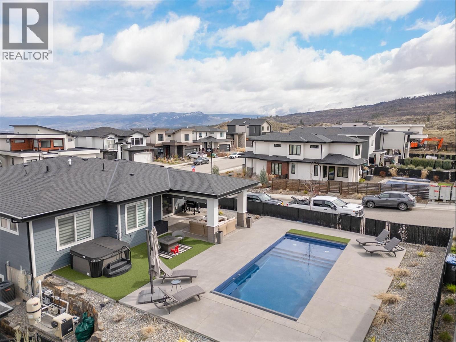 NOTHING BUT FUN & RELAXATION IN UPPER MISSION! - 1235 Ponds Avenue, Kelowna, BC - Outdoor With In Ground Pool With View