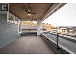 Front Patio with Remote Retractable Sunscreens for privacy, allowing you to expand your living area into the outdoors -