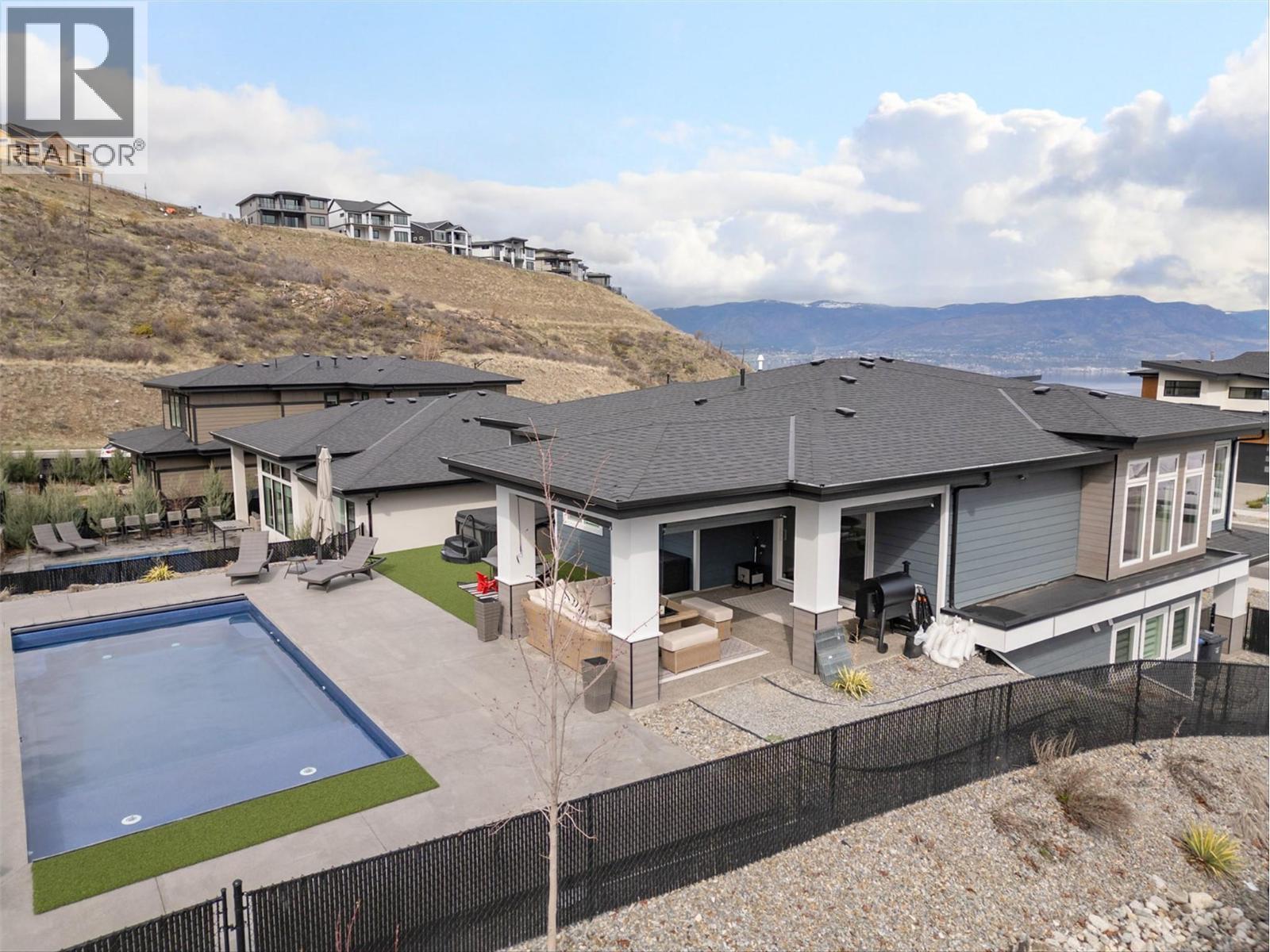 Ideal Plan - Walks out from the main floor into the fenced back yard - 1235 Ponds Avenue, Kelowna, BC - Outdoor