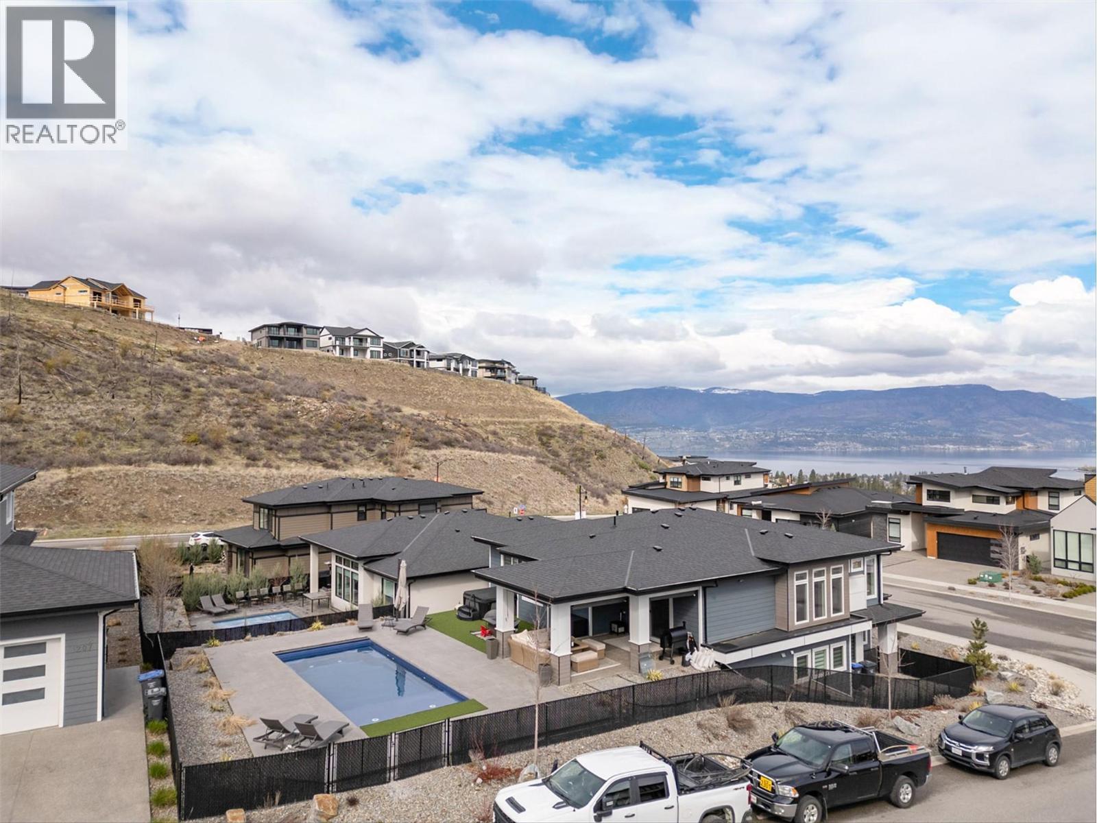 Upper Mission location surrounded by new homes in the desirable Ponds Community. - 1235 Ponds Avenue, Kelowna, BC - Outdoor With View