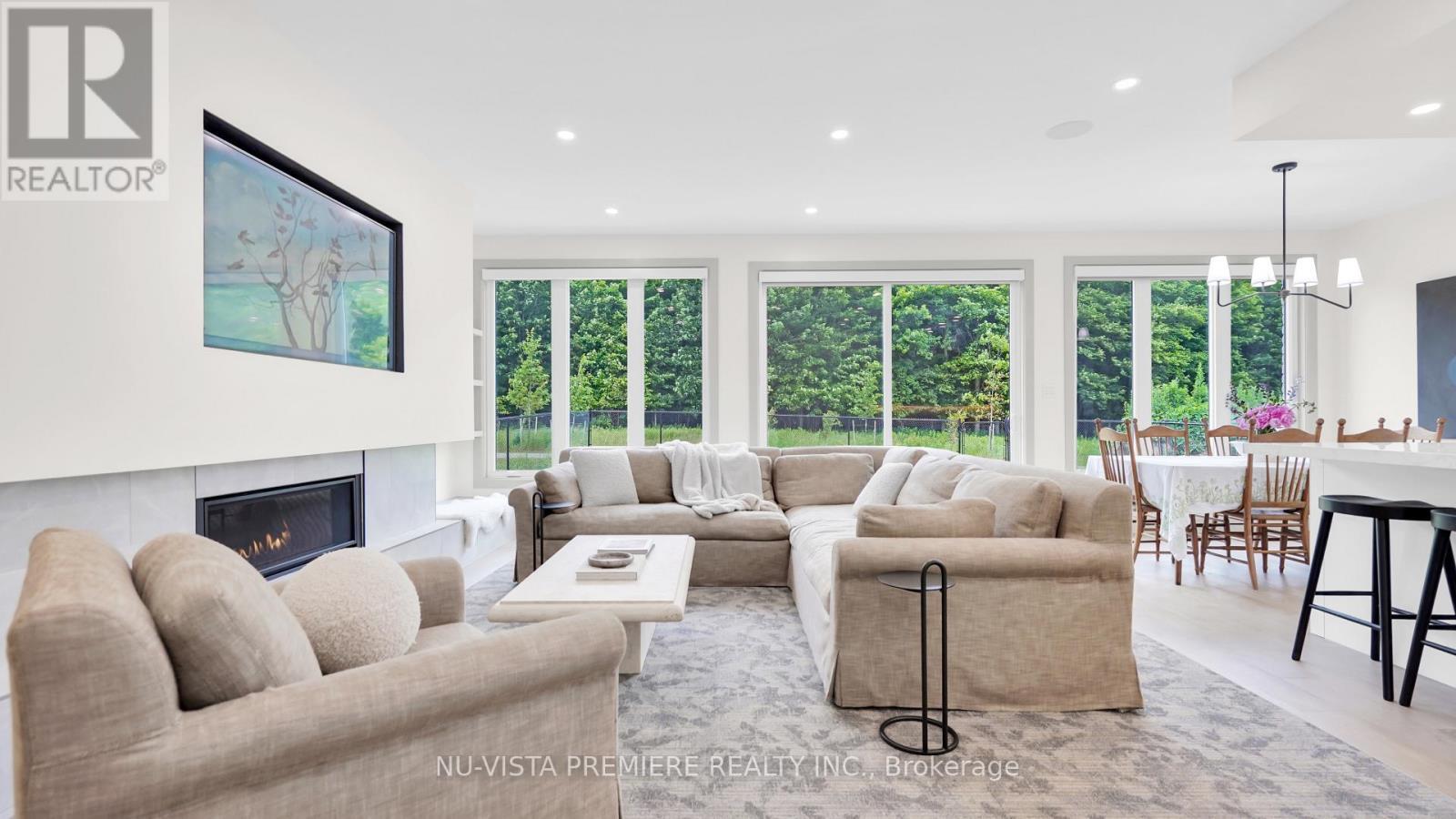 3998 Big Leaf Trail, London South (South V), ON - Indoor Photo Showing Living Room With Fireplace