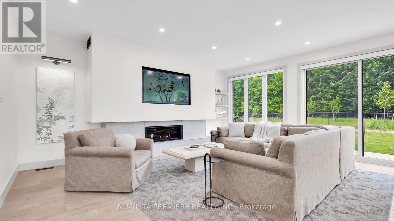 3998 Big Leaf Trail, London South (South V), ON - Indoor Photo Showing Living Room With Fireplace