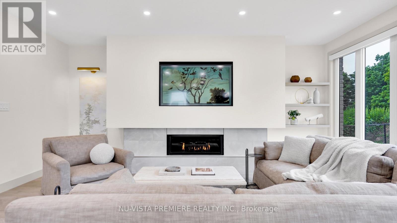 3998 Big Leaf Trail, London South (South V), ON - Indoor Photo Showing Living Room With Fireplace