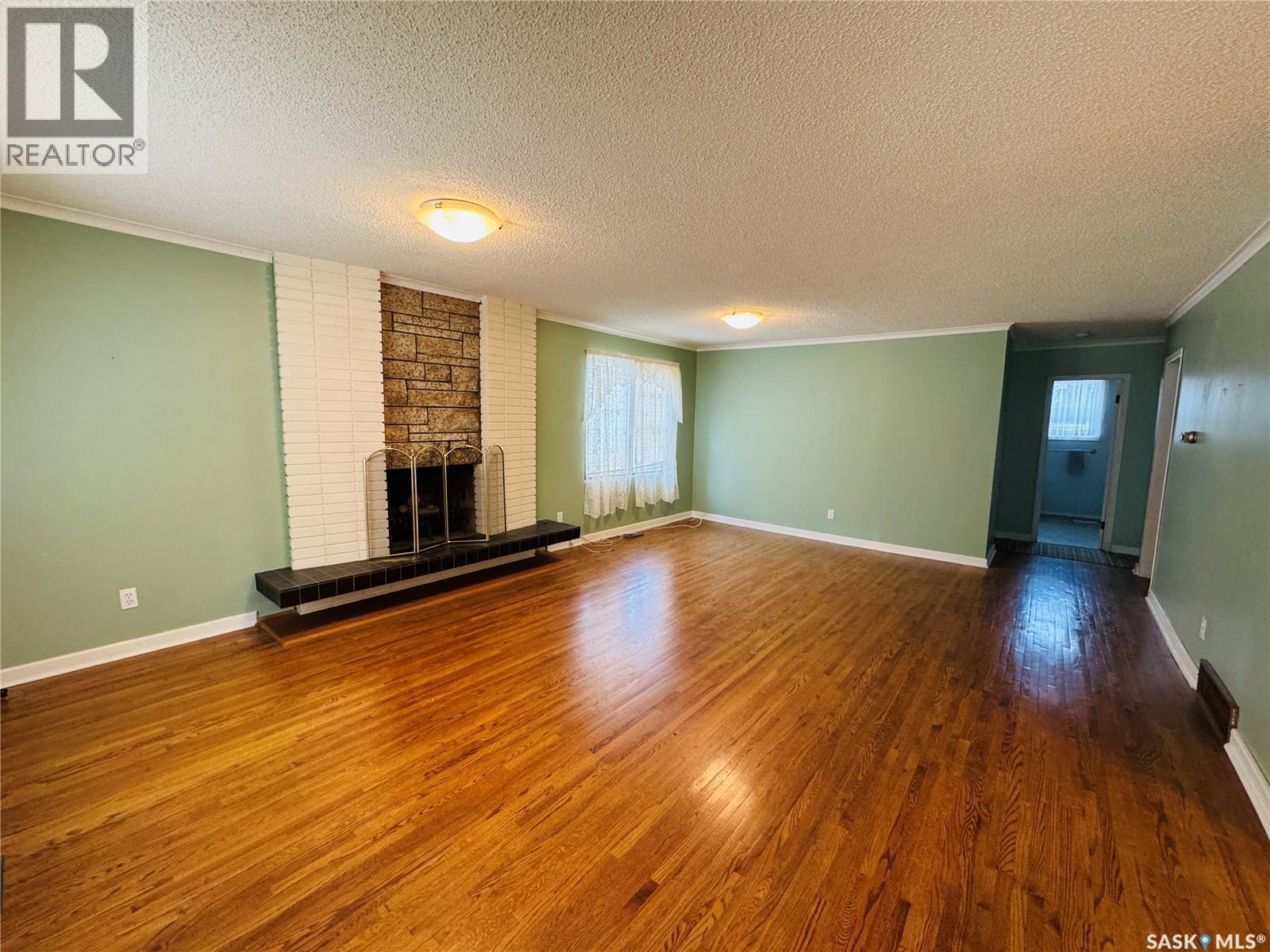 121 2Nd Avenue W, Biggar, SK - Indoor With Fireplace