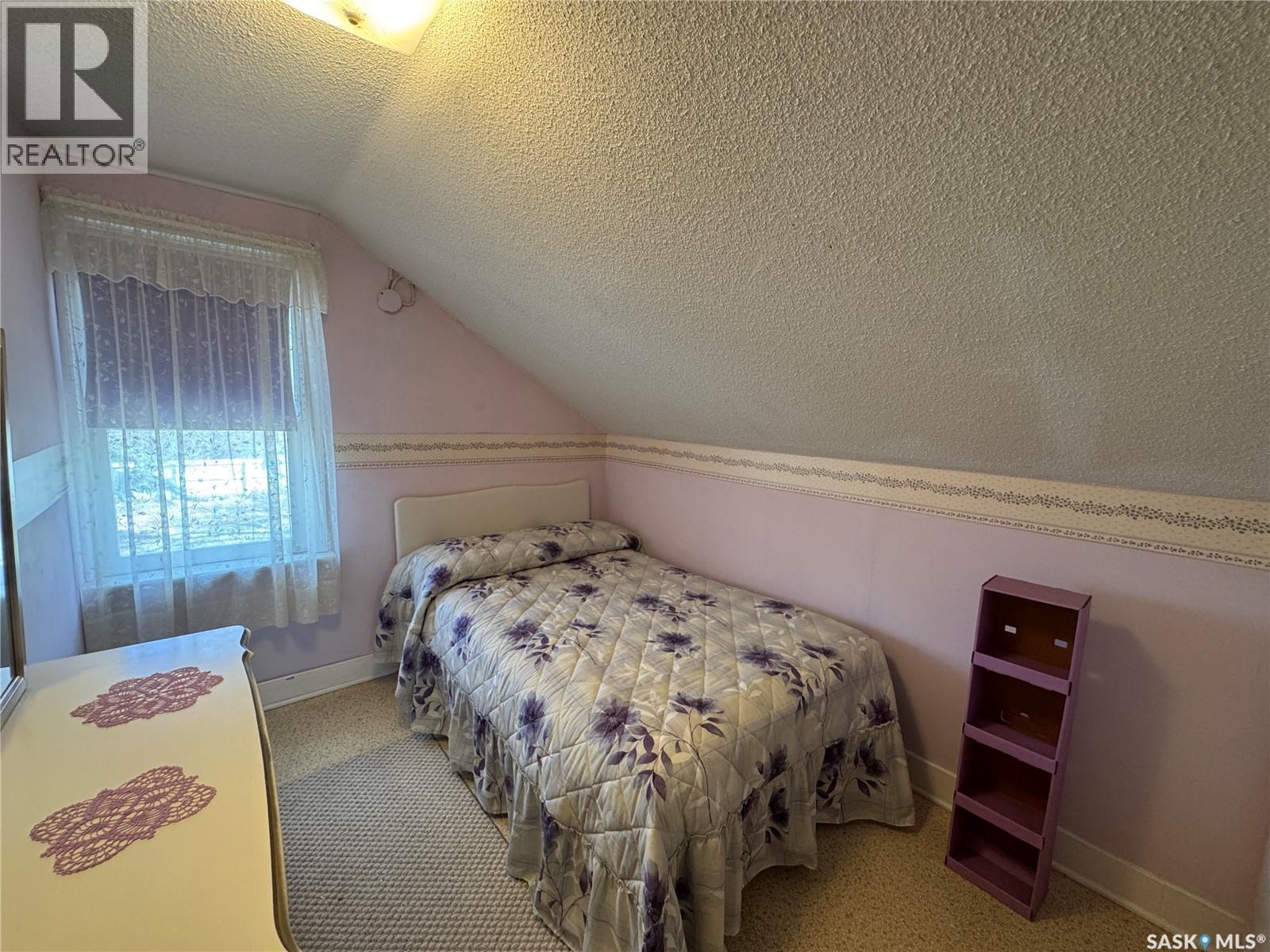 121 2Nd Avenue W, Biggar, SK - Indoor Photo Showing Bedroom