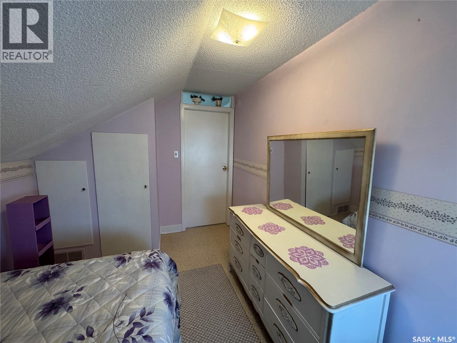 121 2Nd Avenue W, Biggar, SK - Indoor Photo Showing Bedroom