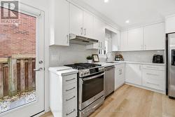 French Door Walkout to Side Yard from Kitchen -