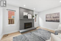 Formal Living Room w/Brick Woodburning Fireplace -