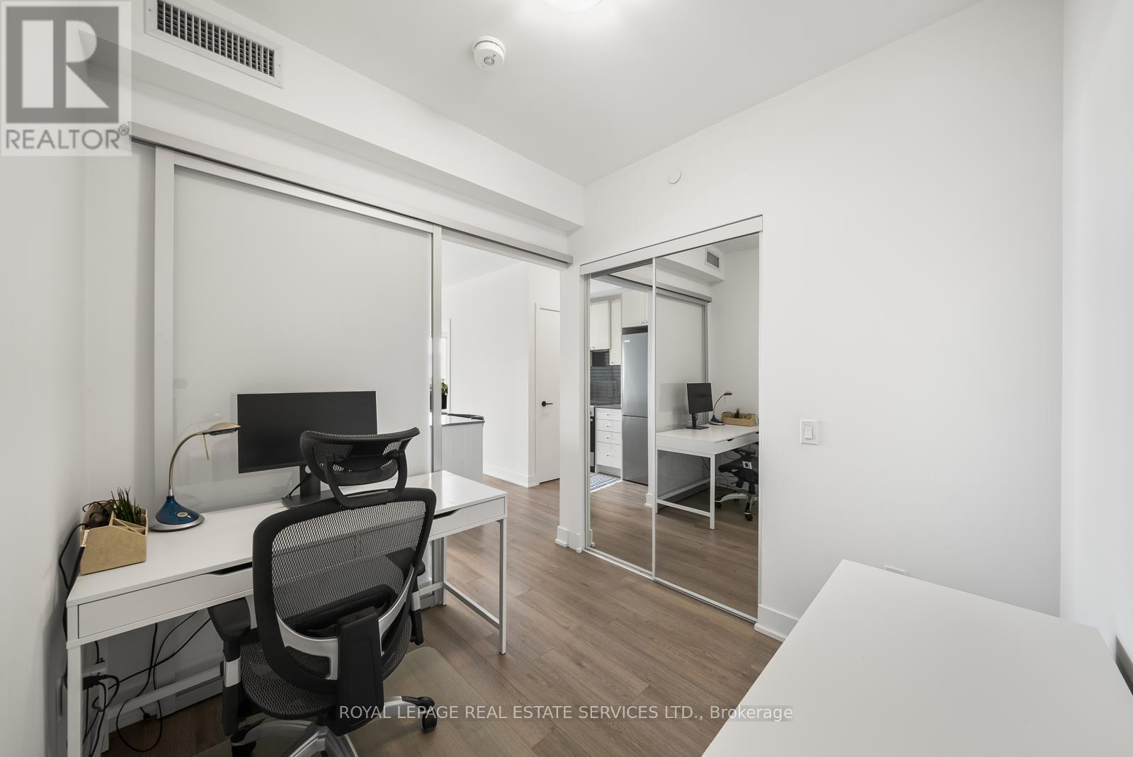 Built-In Closet; Sliding Glass Door - 812 - 50 George Butchart Drive, Toronto, ON - Indoor Photo Showing Office