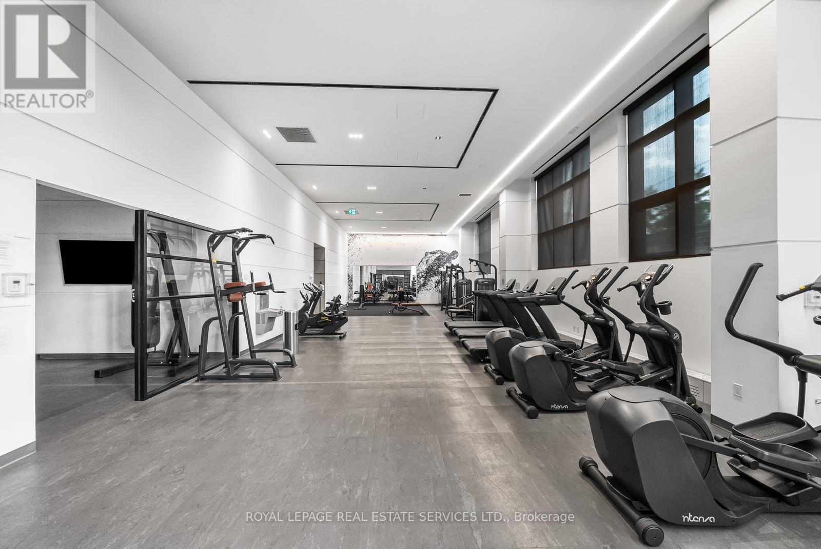 Gym W/ Plenty of Cardio Equipment; Weights; Etc - 812 - 50 George Butchart Drive, Toronto, ON - Indoor Photo Showing Gym Room