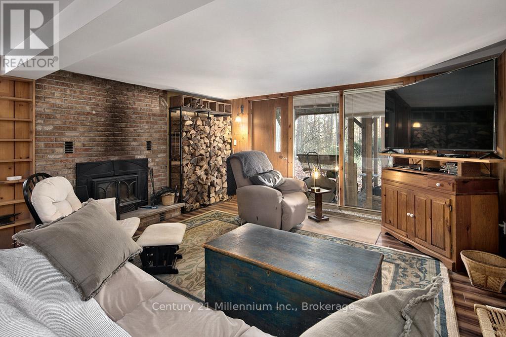 Wood Stove - 265797 25Th Side Road, Meaford, ON - Indoor Photo Showing Living Room With Fireplace