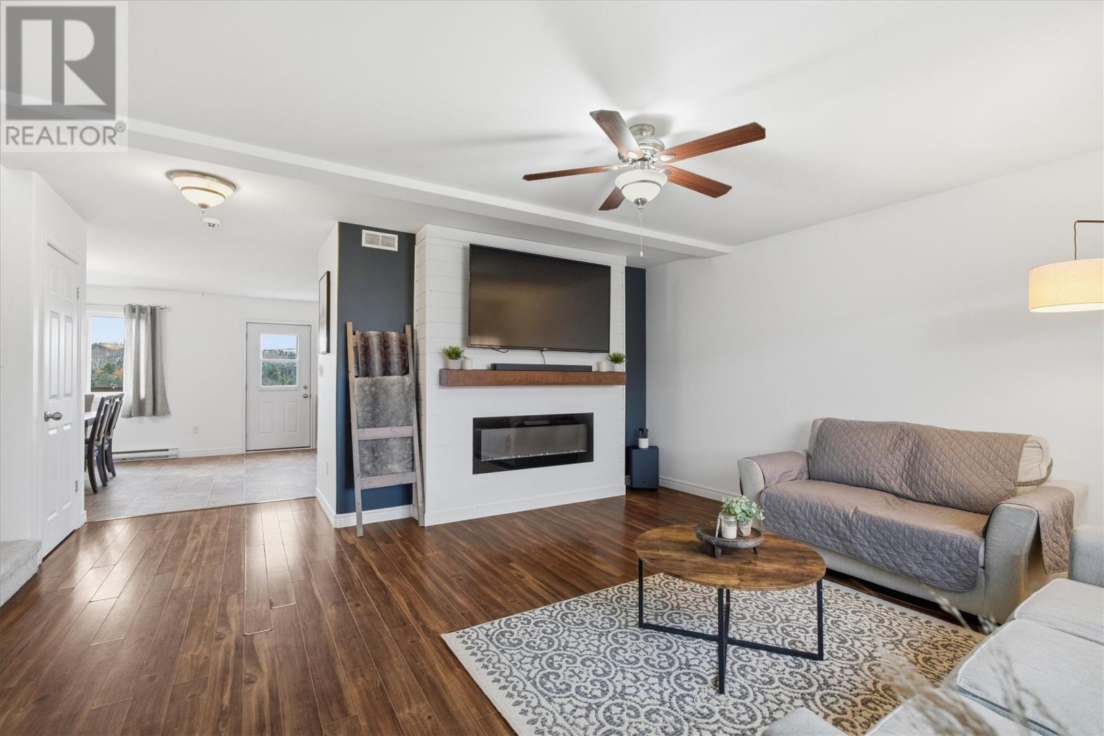 7 Oaken Drive, Conception Bay South, NL - Indoor Photo Showing Living Room With Fireplace