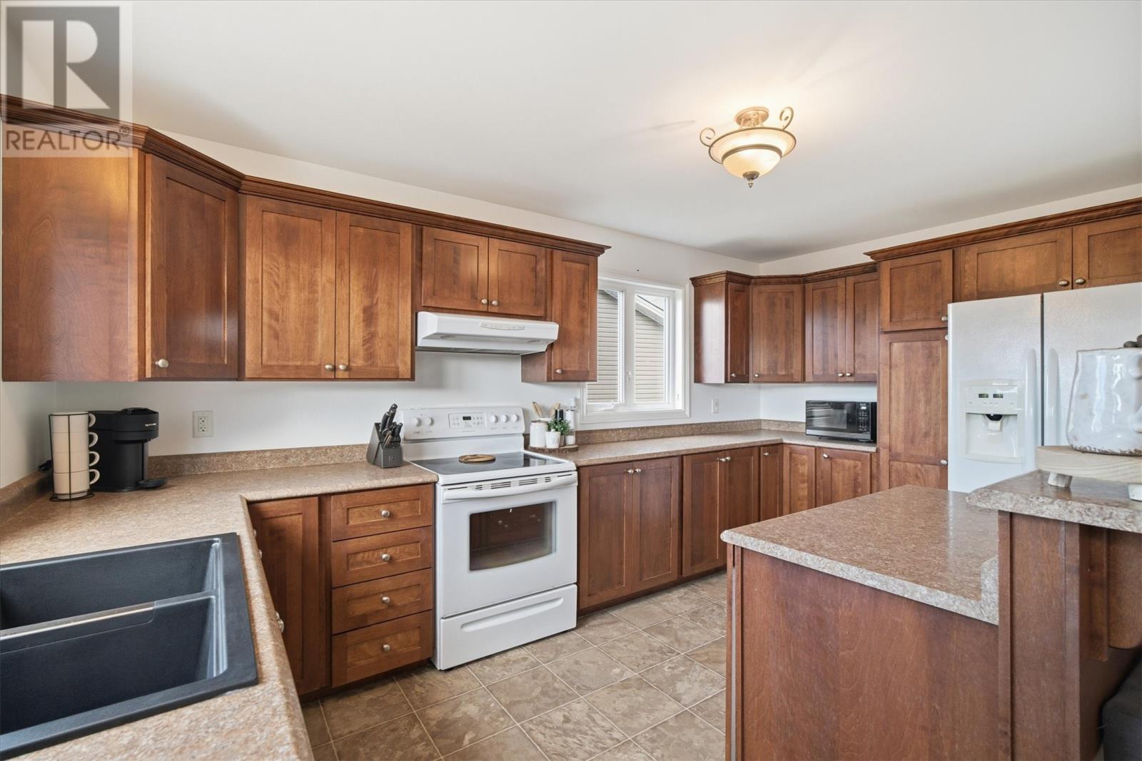 7 Oaken Drive, Conception Bay South, NL - Indoor Photo Showing Kitchen With Double Sink