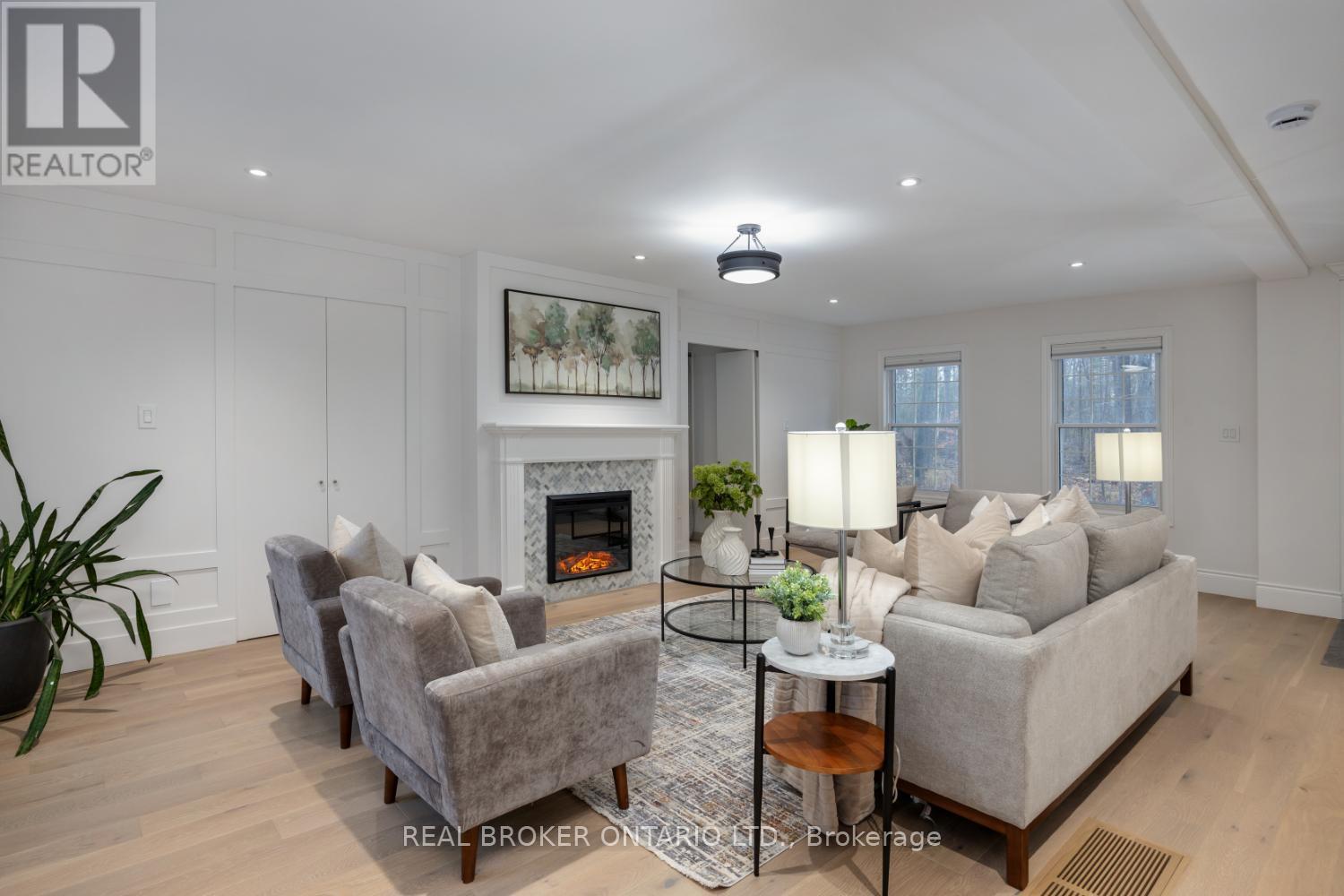 398 Sandy Hook Road, Kawartha Lakes (Manvers), ON - Indoor Photo Showing Living Room With Fireplace
