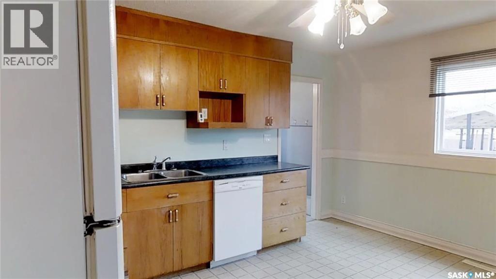 213 Stevens Avenue, Birch Hills, SK - Indoor Photo Showing Kitchen With Double Sink