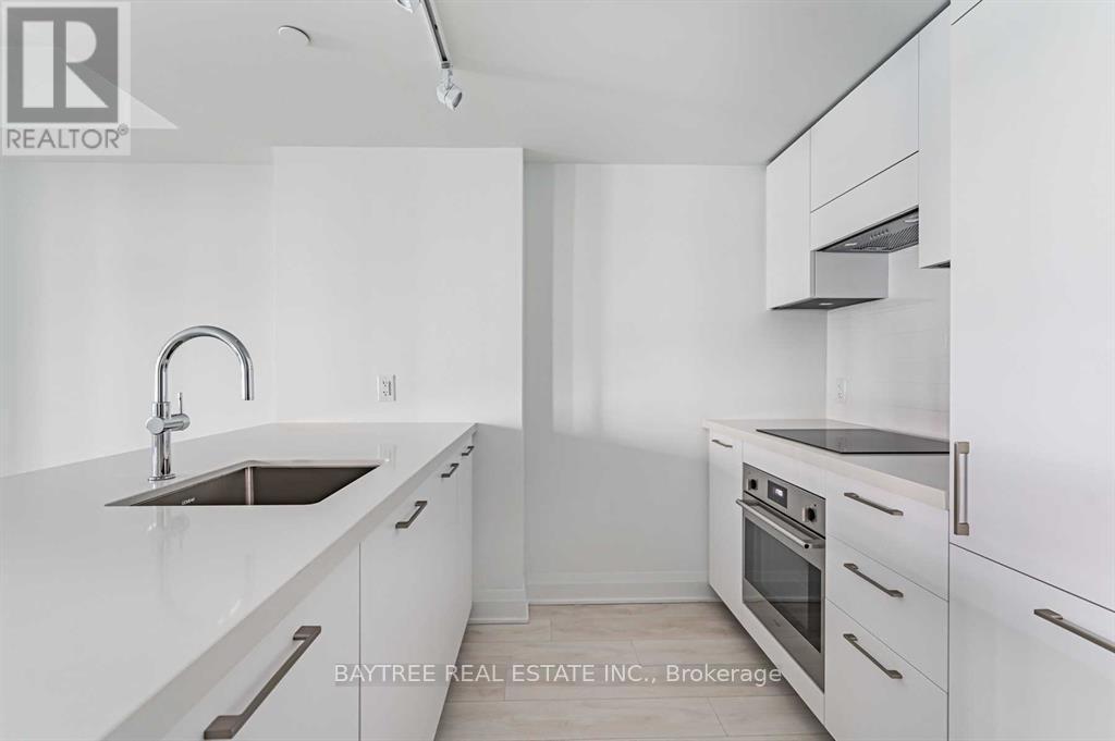 334 - 33 Frederick Todd Way, Toronto, ON - Indoor Photo Showing Kitchen