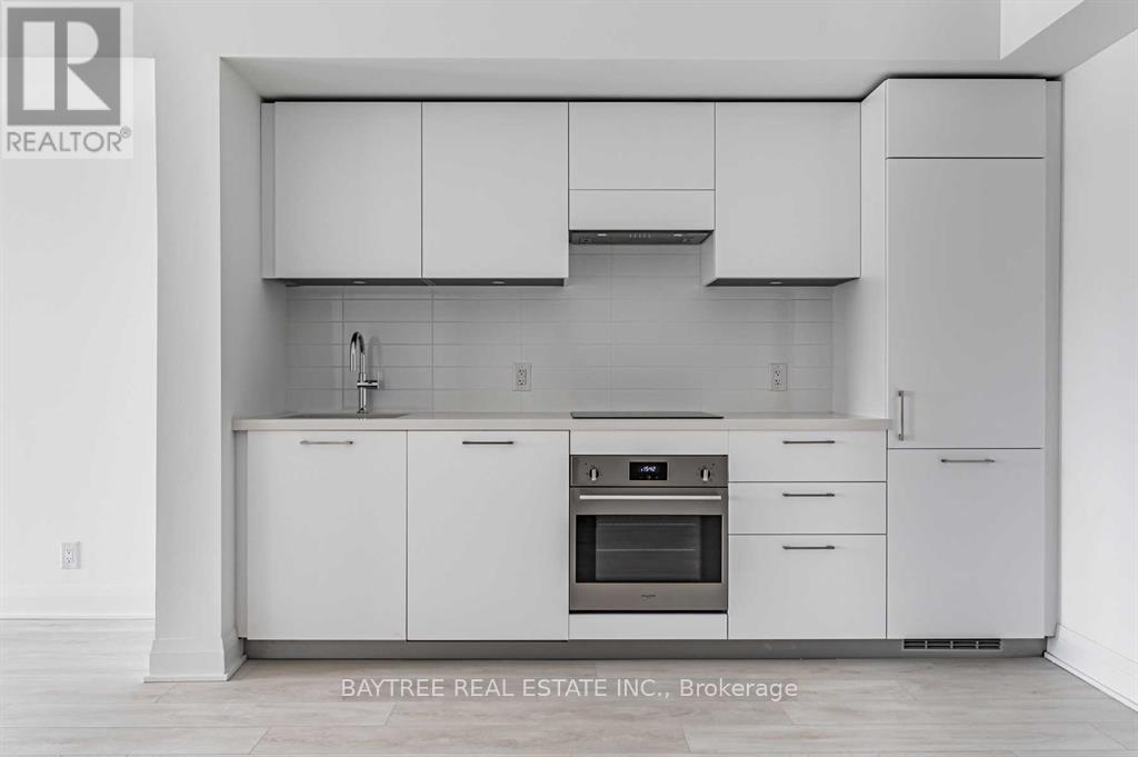 414 - 33 Frederick Todd Way, Toronto, ON - Indoor Photo Showing Kitchen