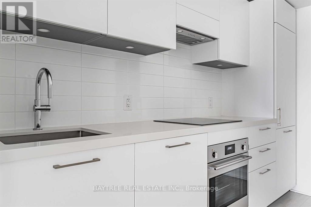 414 - 33 Frederick Todd Way, Toronto, ON - Indoor Photo Showing Kitchen