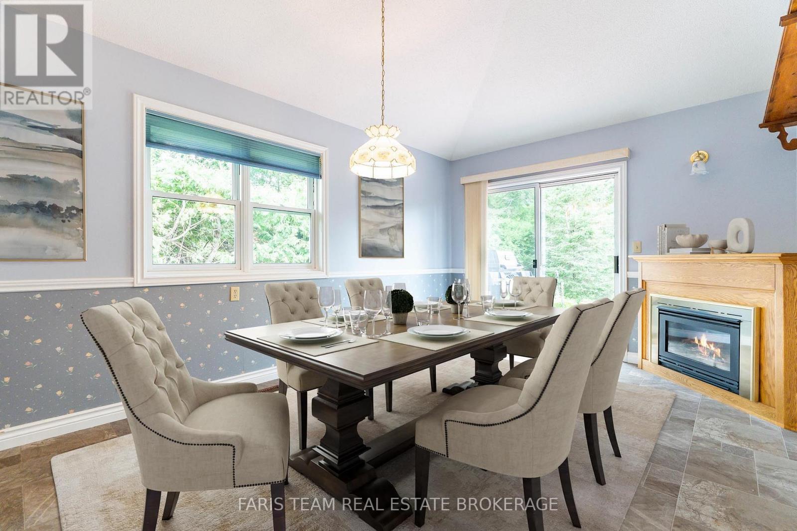 53 Maple Drive, Orillia, ON - Indoor Photo Showing Dining Room With Fireplace