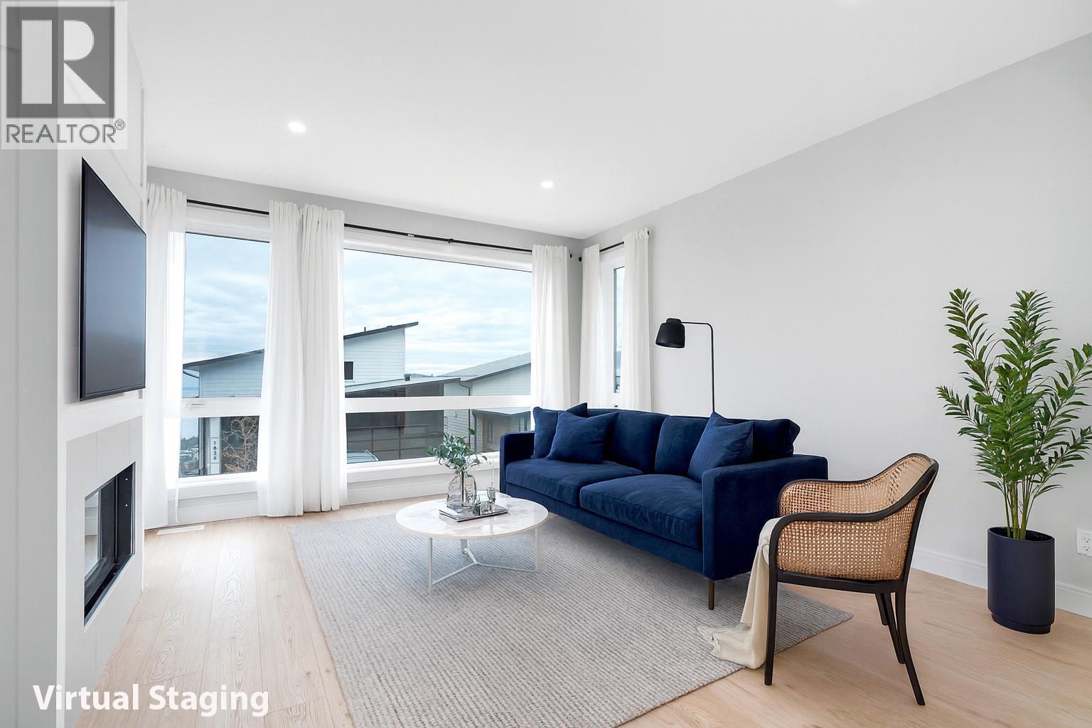 Virtual Staged Living room - 1839 Grey Owl Court, Kelowna, BC - Indoor Photo Showing Living Room With Fireplace