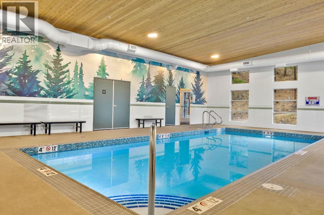 1839 Grey Owl Court, Kelowna, BC - Indoor Photo Showing Other Room With In Ground Pool