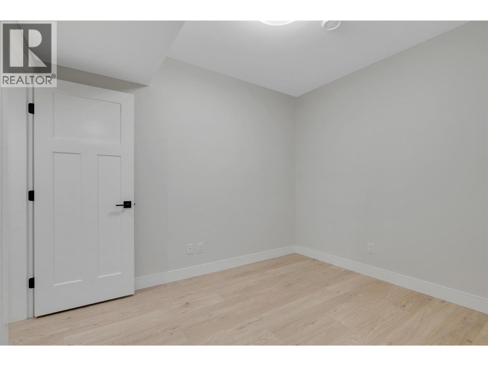 Entry level bedroom - 1839 Grey Owl Court, Kelowna, BC - Indoor Photo Showing Other Room