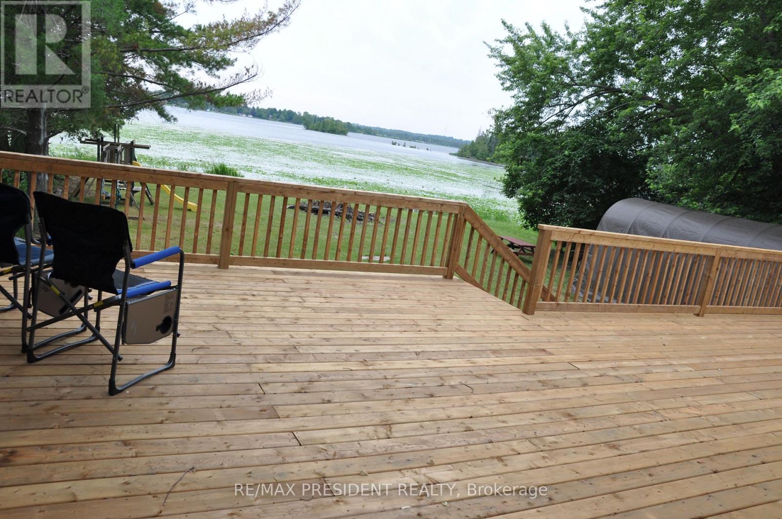 17 Cedar Bay Road, Kawartha Lakes, ON - Outdoor With Body Of Water With Deck Patio Veranda With Exterior
