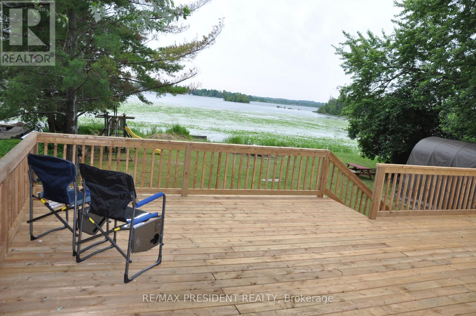 17 Cedar Bay Road, Kawartha Lakes, ON - Outdoor With Body Of Water With Deck Patio Veranda